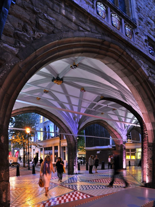 Tile Mile beneath St John's Gate at dusk.