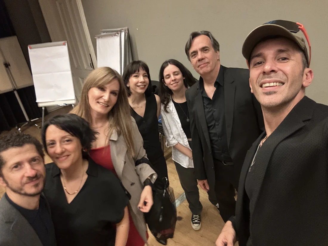 A photograph with the speakers and team after the talks