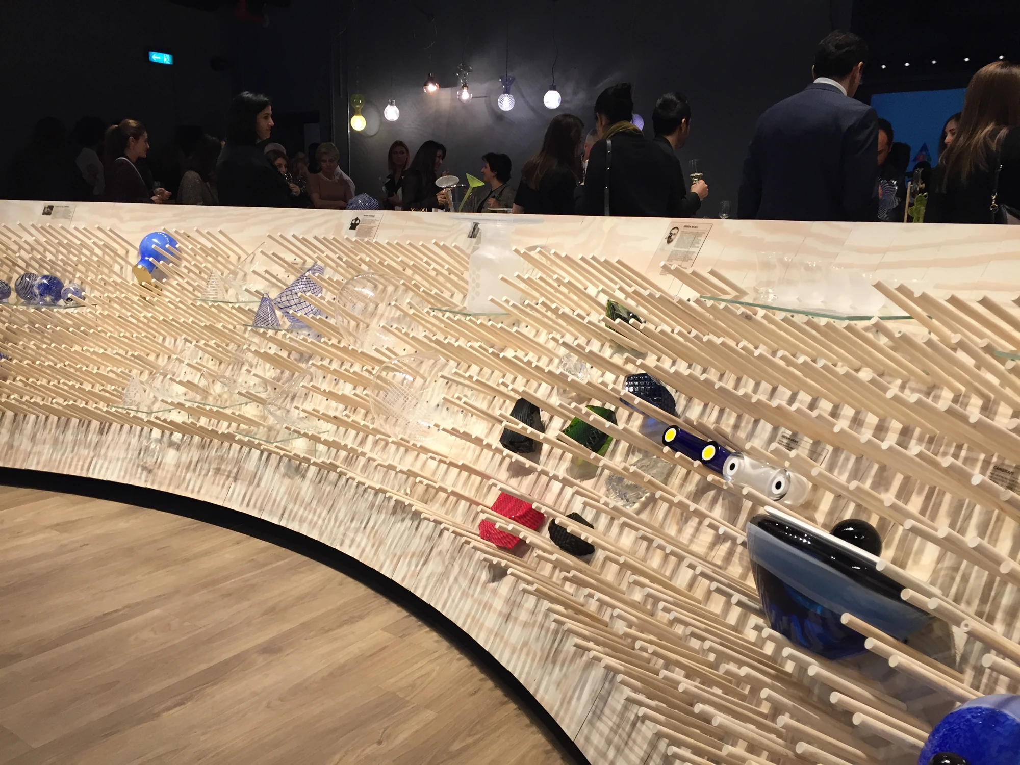 The Omnia launch exhibition, with a curved display designed by Autoban