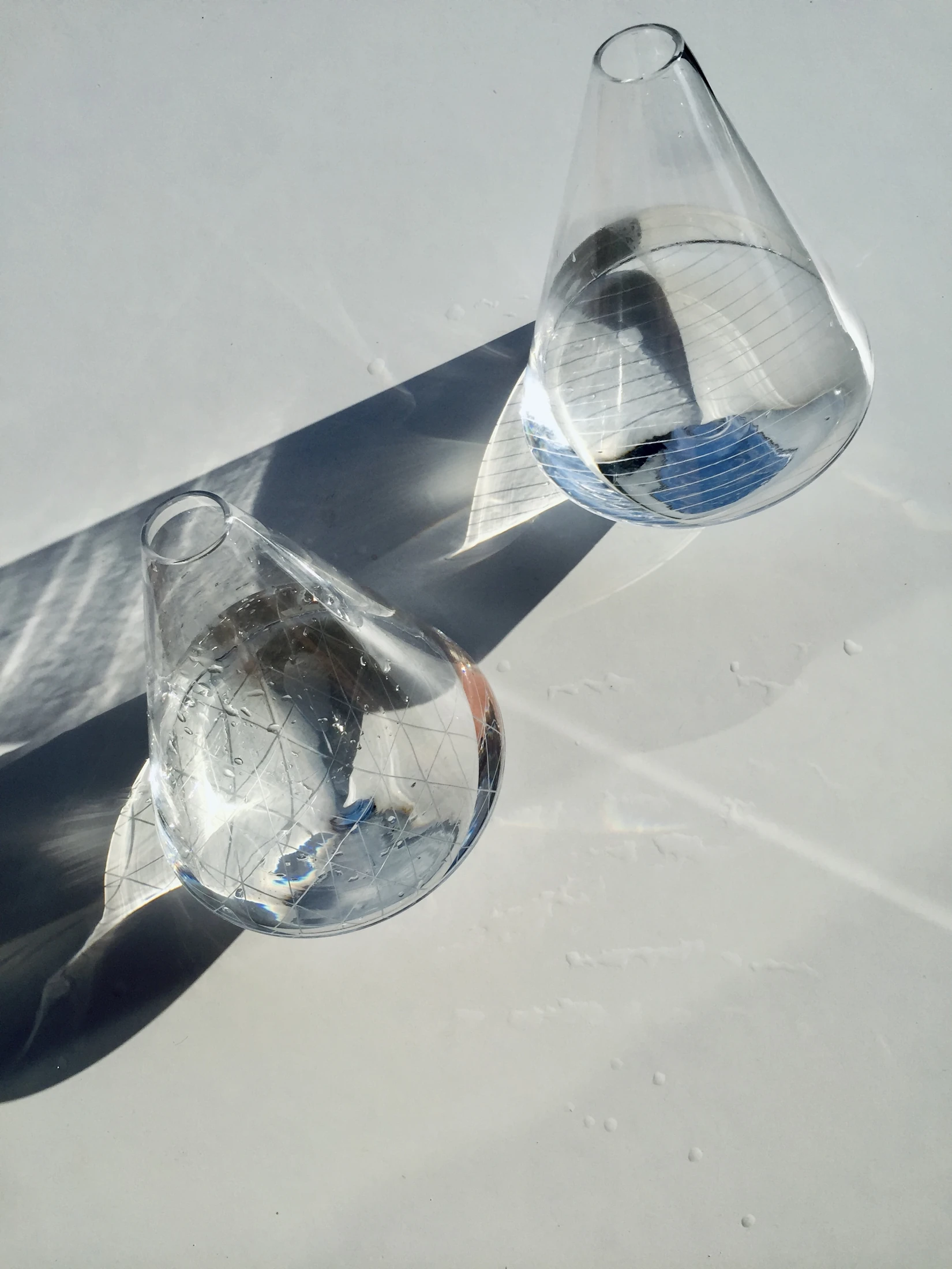 Glass, water and shadows seen from above