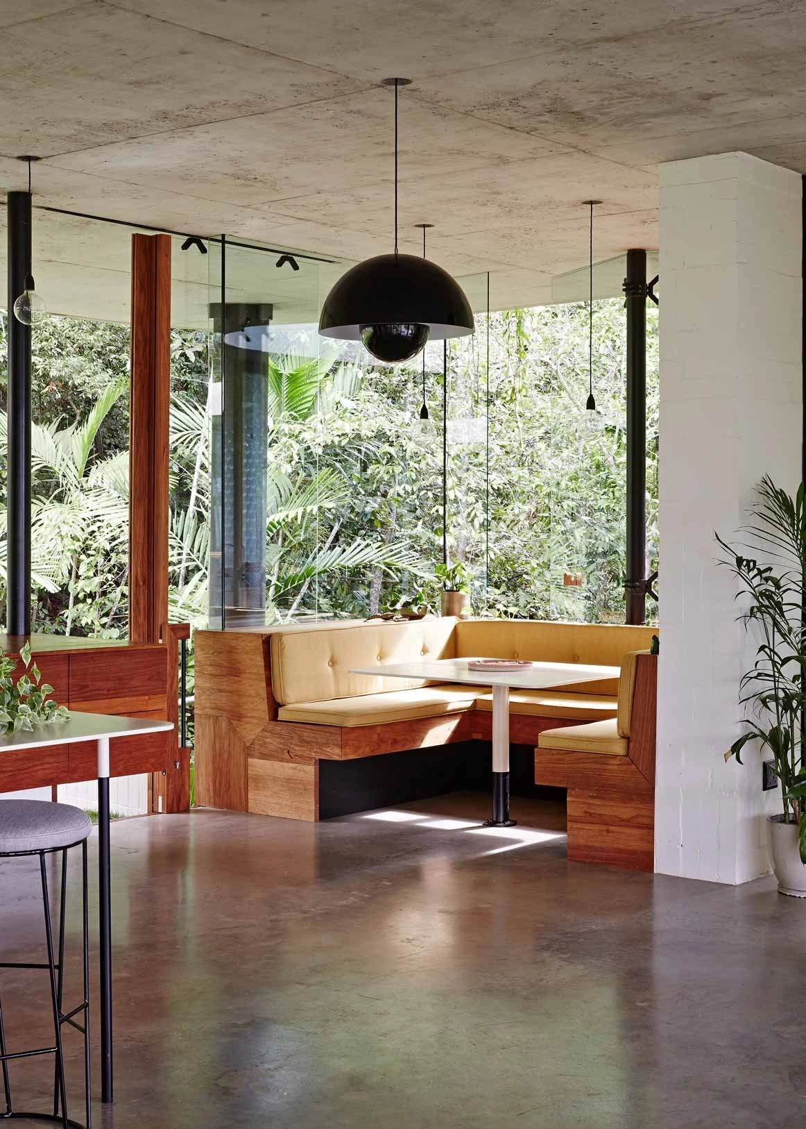 Dining corner and pendant light beside the forest
