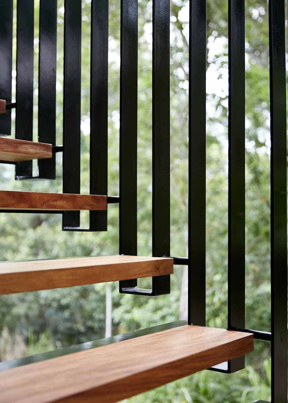 Timber window and black steel details