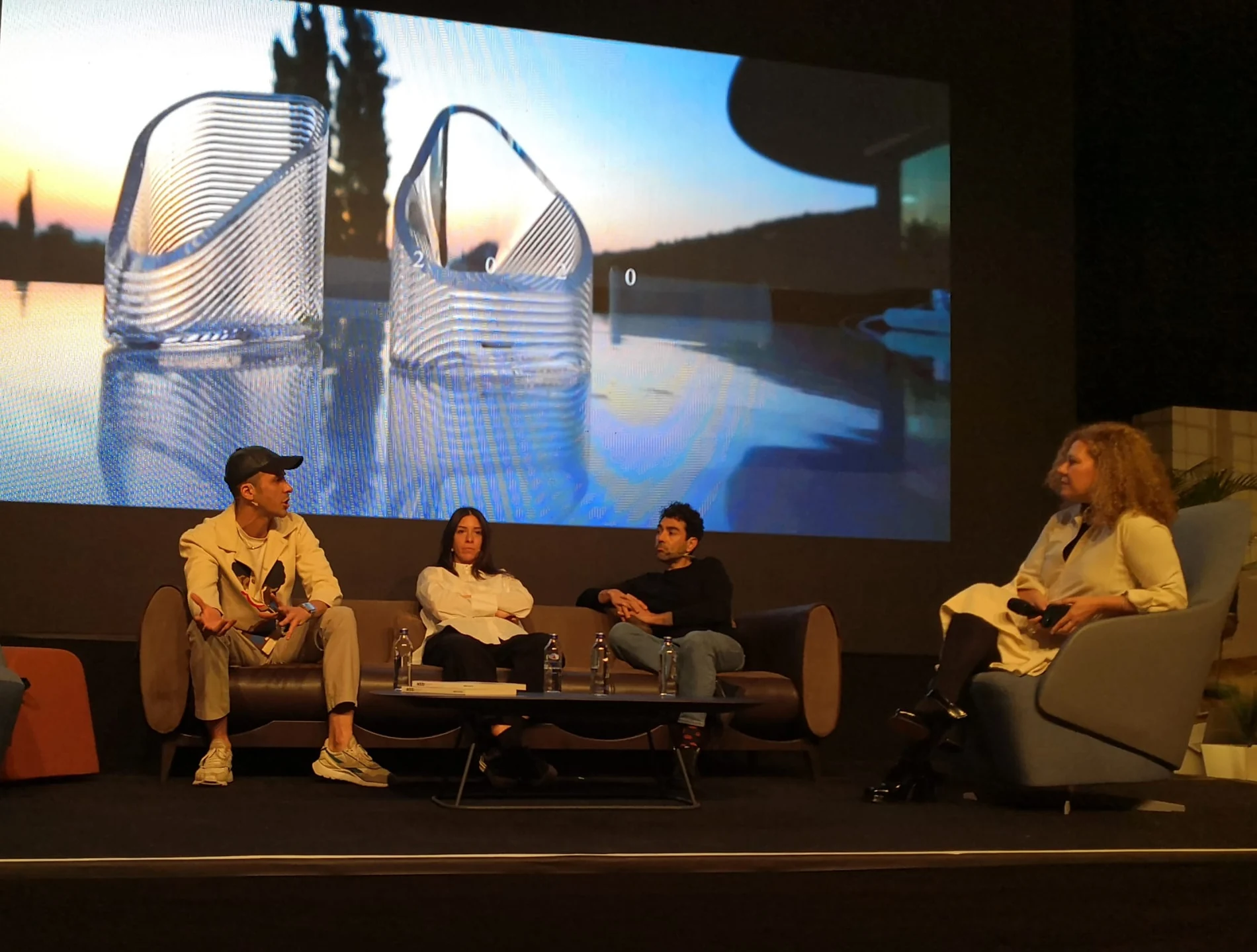Tamer Nakışçı’s glass work on screen during the conversation